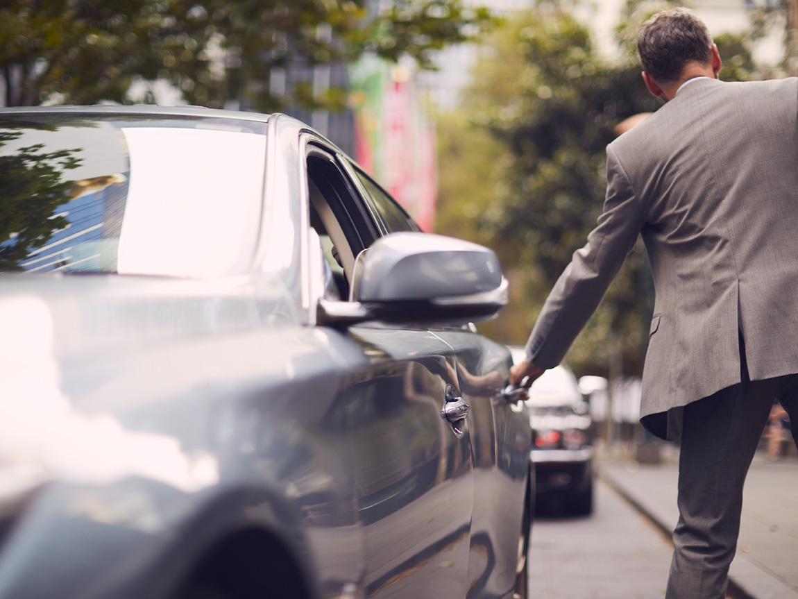Man catching a ride share
