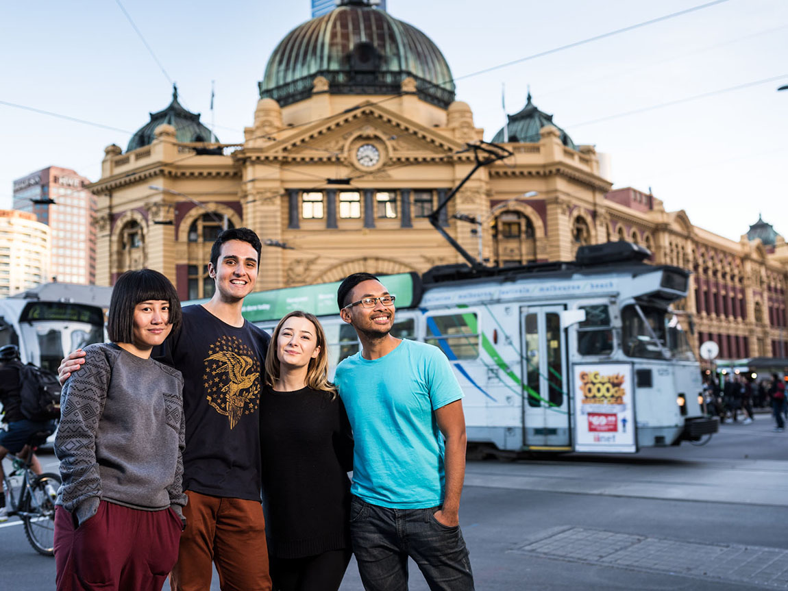 International students outside Flinders Street Station, Melbourne, Victoria, Australia. Photo: DJPR